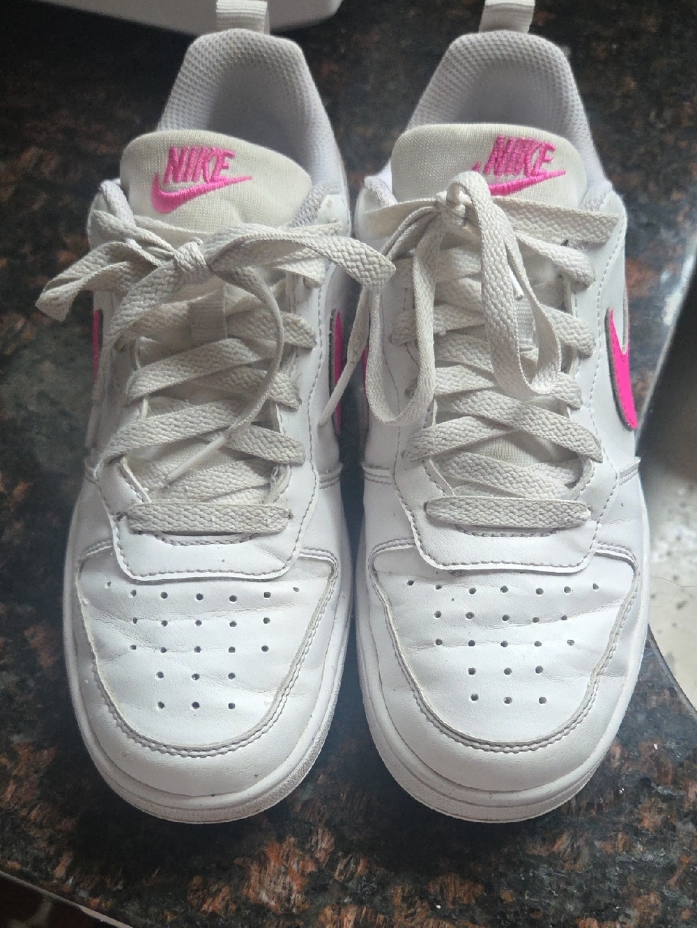 Nike White Low-Top Sneakers with Pink Swoosh